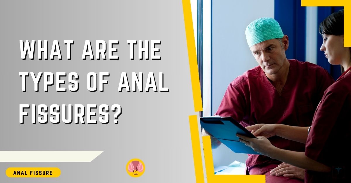 An informative medical presentation slide asking 'What are the types of Anal Fissures?' in bold lettering. The slide is part of educational material provided by Dr. Rajarshi Mitra, Specialist Laparoscopic Surgeon & Proctologist in Abu Dhabi. It depicts two medical professionals in scrubs, a man and a woman, engaged in a discussion over a digital tablet. The male surgeon, wearing a surgical cap, appears to be explaining a point to the attentive female colleague. The slide features a clean design with yellow and blue accents framing the content.
